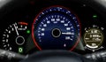 Car dashboard speedometer moving in high speed