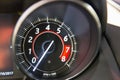 Car dashboard tachometer closeup Royalty Free Stock Photo