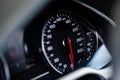 Car dashboard with white backlight: Odometer, speedometer, tachometer, fuel level, water temperature and more. Royalty Free Stock Photo