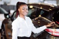 Car dealer woman. Auto dealership and rental concept