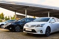 Car dealership - many vehicles parked for sale in a row Royalty Free Stock Photo