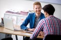 Car dealership salesman with costumer Royalty Free Stock Photo