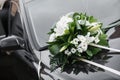 Car decoration. Colorful bridal bouquet, wedding day accessories. Royalty Free Stock Photo