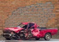 Car demolished brick wall. Royalty Free Stock Photo