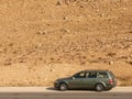 Car on a desert highway Royalty Free Stock Photo