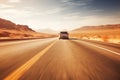 Car on desert highway road. Car trip along desert mountain landscape, steppe road Royalty Free Stock Photo