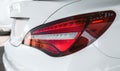 Car detailing : Glass coating Closeup modern glossy shine modern luxury white Back lights headlight and head lamp sport car . Royalty Free Stock Photo