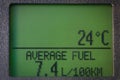 Car display with average fuel consumption and temperature