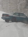 Car ditch snow storm wintry Royalty Free Stock Photo