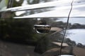 Car door handle. Keyless entry car door handle with keyless go touch sensor. Automatic opening of a car door without a key. Access Royalty Free Stock Photo