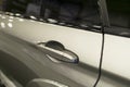 Car door handle of a modern car with car exterior details Royalty Free Stock Photo