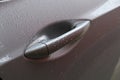 Car door handle in rain Royalty Free Stock Photo