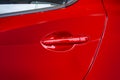 Car door handle red color for customers. Using wallpaper or back Royalty Free Stock Photo