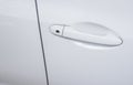 Car door handle white color modern car,Close up Royalty Free Stock Photo