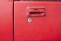 Car door - lock - old classic red car that is being repaired Royalty Free Stock Photo