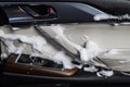 Car door trim in cleaning foam. Royalty Free Stock Photo