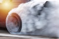 Car drifting, Blurred  image diffusion race drift car with lots of smoke from burning tires on speed track Royalty Free Stock Photo