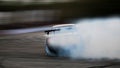 Car drifting, Burning rubber wheel drifting with a lot of smoke Royalty Free Stock Photo