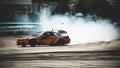 Car drifting, Sport car wheel drifting and smoking on blurred background. Motorsport concept Royalty Free Stock Photo