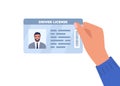 Car driver license in hand. Human hand holding the id card. Vector illustration Royalty Free Stock Photo