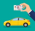 Car driver license identification card in hand Royalty Free Stock Photo