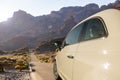 Car driving along a desert road