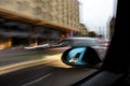 Car driving in the city with motion blur