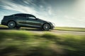 Car driving on country road with motion blur effect. Generative AI Royalty Free Stock Photo