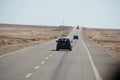 Car driving on desert road Royalty Free Stock Photo