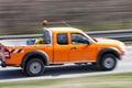 Car driving down country road Royalty Free Stock Photo