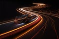 a car driving down a highway at night time with lights on it\'s side and a blurry image of the car Royalty Free Stock Photo