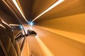 Car driving fast exit the tunnel Royalty Free Stock Photo