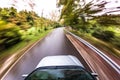 Car driving fast, fisheye photo