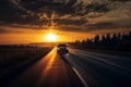 Car driving fast on the highway road against sky with sunset Royalty Free Stock Photo