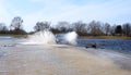 Car driving on the flood way, Lithuania Royalty Free Stock Photo