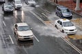 Car Driving On Flooded Street