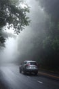 Car driving through the fog Royalty Free Stock Photo