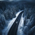 car is driving on highway road with snow in nature with a snowy forest in winter on a journey. Landscape with a view