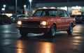 Car driving at night with headlights shining on dark street Royalty Free Stock Photo