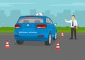 Car driving practice test with red cones. Student driver driving a blue suv car. Instructor makes a stop gesture with hand. Royalty Free Stock Photo