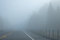 Car Driving Through Thick Fog in Early Morning #5 Royalty Free Stock Photo