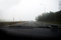 Car driving in thick fog Royalty Free Stock Photo