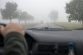 Car driving in thick fog Royalty Free Stock Photo