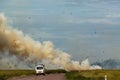 car driving to a controlled Bushfire in Kakadu National Park, with diffrent birds, Northern Territory, Australia