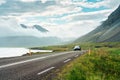 Car driving through the valley with foggy on the road during summer in sunny day Royalty Free Stock Photo