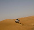 A car dune bashing in a desert in Dubai, UAE Royalty Free Stock Photo