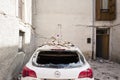 Car in earthquake rubble, Rieti Emergency Camp, Amatrice, Italy