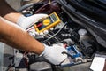 Car Electronic Maintenance Service And Check. Worker Man Royalty Free Stock Photo