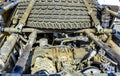 Car Engine in the back of an offroad vehicle dirty from the desert with a spare tire Royalty Free Stock Photo