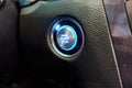 Car engine start button with blue backlight Royalty Free Stock Photo